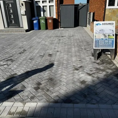 front charcoal block paved driveway side entrance 01