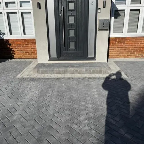 front charcoal block paved driveway side entrance 23