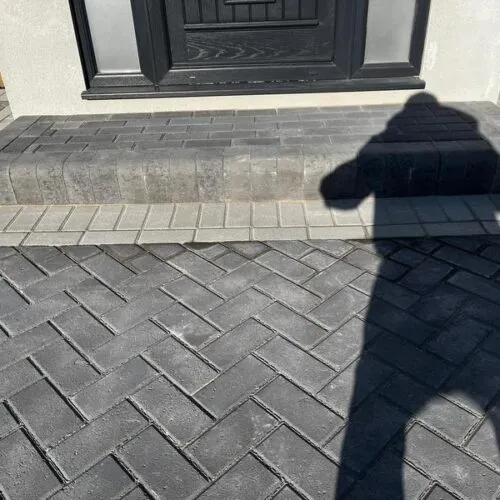 front charcoal block paved driveway side entrance 25